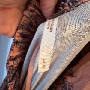 Free people salmon multi colored backless one piece